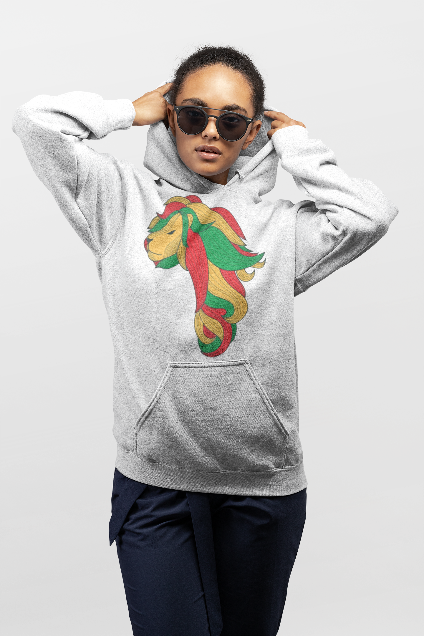 Home mockup of a woman adjusting her hoodie while wearing trendy sunglasses 24293